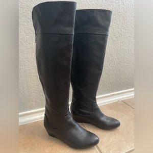 JLO black wedge zip up boots
